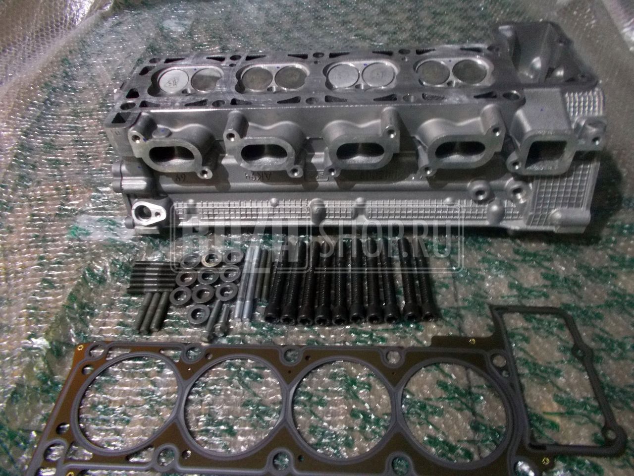 Головка блока в сб. УАЗ 409051, 409052 дв. ZMZ-PRO (Евро-5) бензин/газ, трёхопорная КОМПЛЕКТ "ЗМЗ" / 409051.3906562 (406240.1003007-21, с усиленными выпускными клапанами)